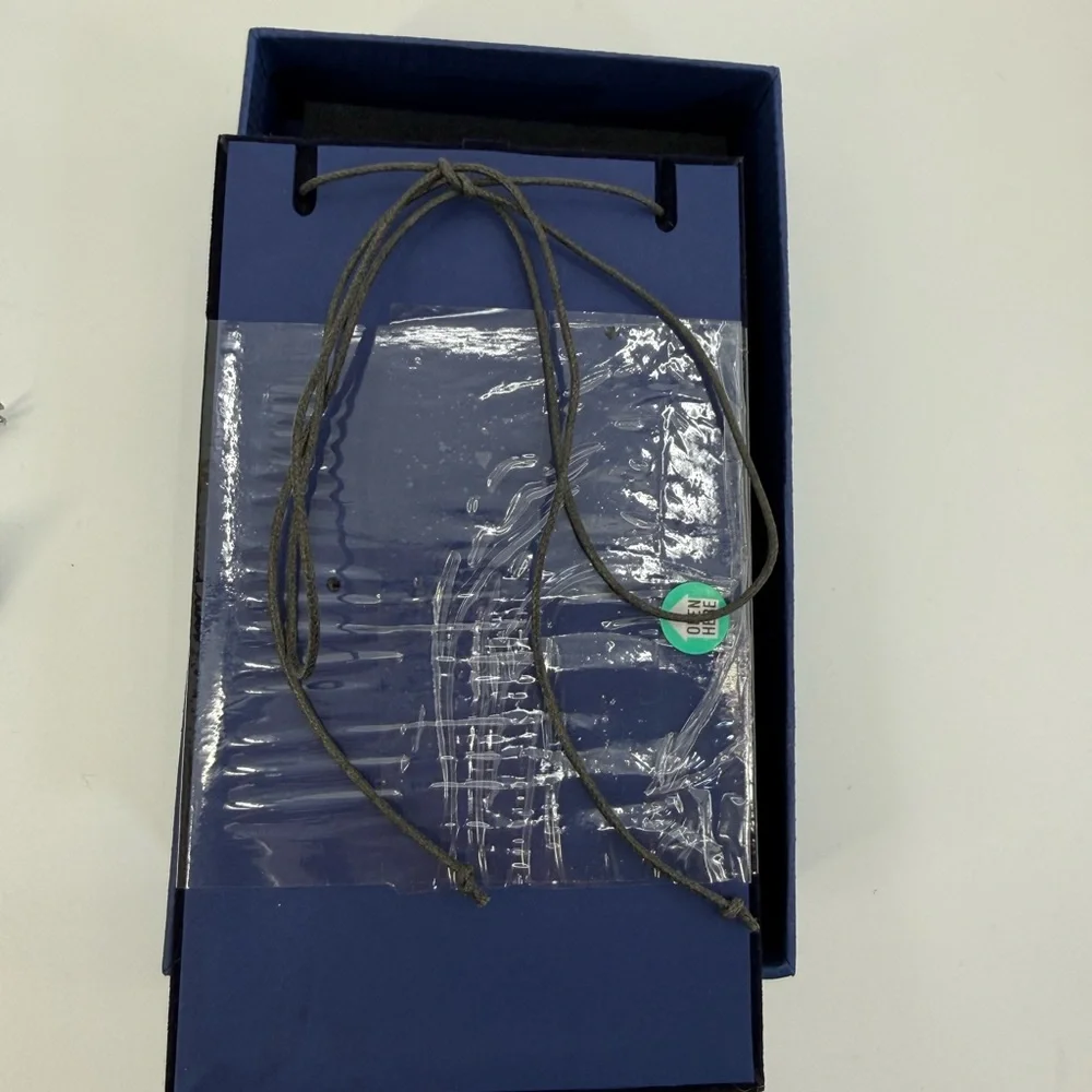 SWAROVSKI Aqua Scuro Crystal Teardrop Pendant Necklace On Black Cord-5083475